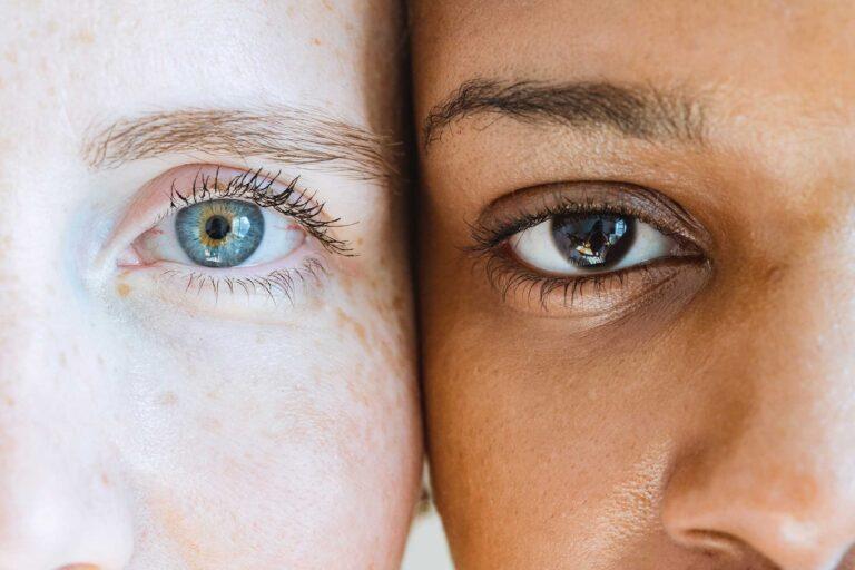 Close up of two women side by side showing their eyes