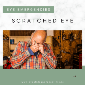 Man suffering from an eye injury at work